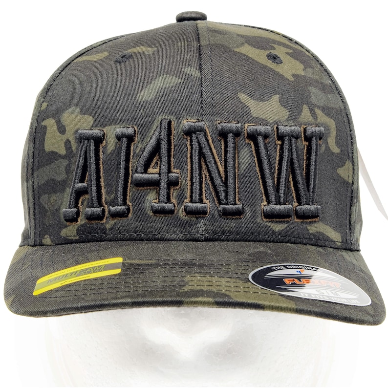 Black Multicam Flexfit cap with raised AI4NW call sign embroidery
